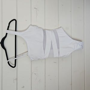 Women's White one piece swimsuit with center mesh. Size Medium